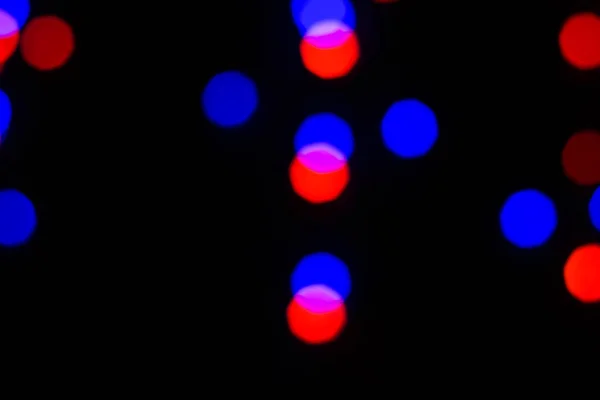 Bokeh azzurrato astratto colorato da luci di notte — Foto Stock