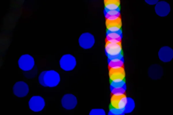 Barevné abstraktní blured bokeh od světel v noci — Stock fotografie