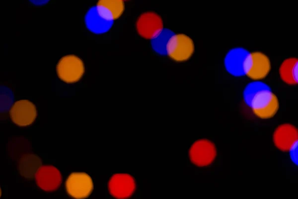 Kleurrijke abstracte blured bokeh van lichten 's nachts — Stockfoto