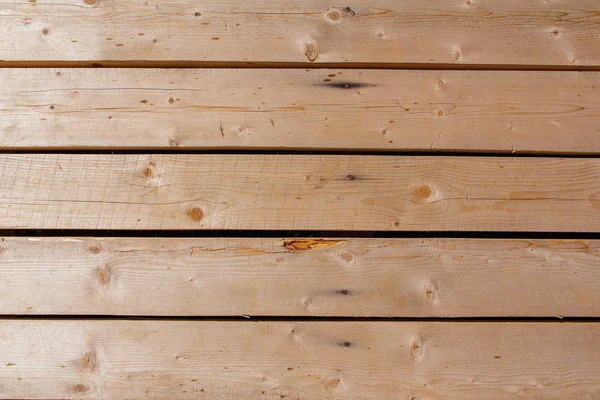 Wooden natural texture. Brown wooden planks background. Royalty Free Stock Images