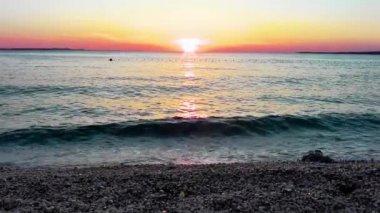 Hırvatistan'da deniz üzerinde gün batımı, Zadar.