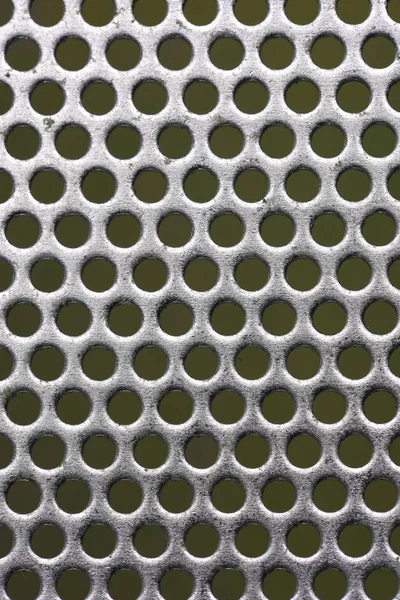 Glanzende Metalen Oppervlak Met Gaten — Stockfoto