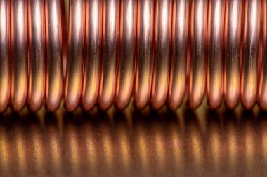 Makro arka plan olarak metal yüzeyi bakır bobin