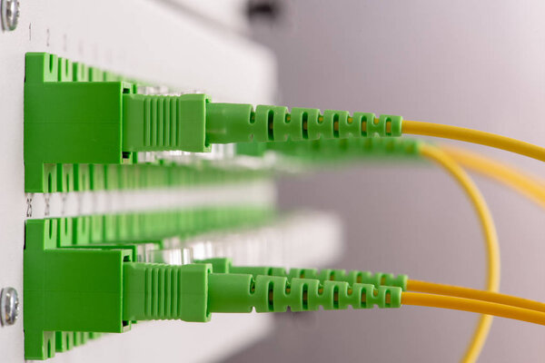 Technology data center with fiber optic distribution panel close-up