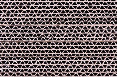 Doku arka plan olarak oluklu mukavva levhayığını