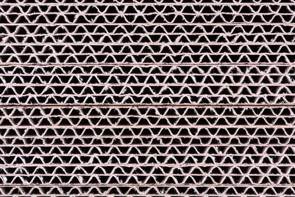 Doku arka plan olarak oluklu mukavva levhayığını