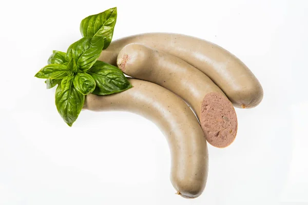 Salsiccia Con Vegetazione Uno Sfondo Studio Isolato — Foto Stock