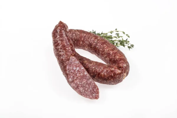 Wurst Mit Grün Auf Isoliertem Studiohintergrund — Stockfoto