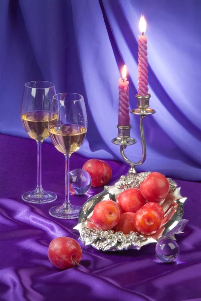 Glasses, Apricots And Candles — Stock Photo, Image