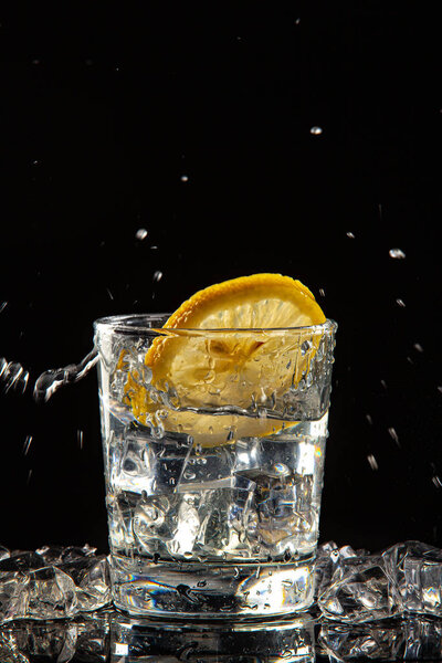Glass Of Water, Ice And Lemon