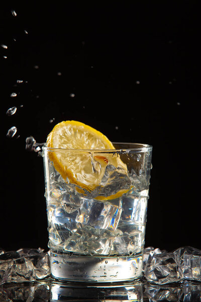 Glass Of Water, Ice And Lemon