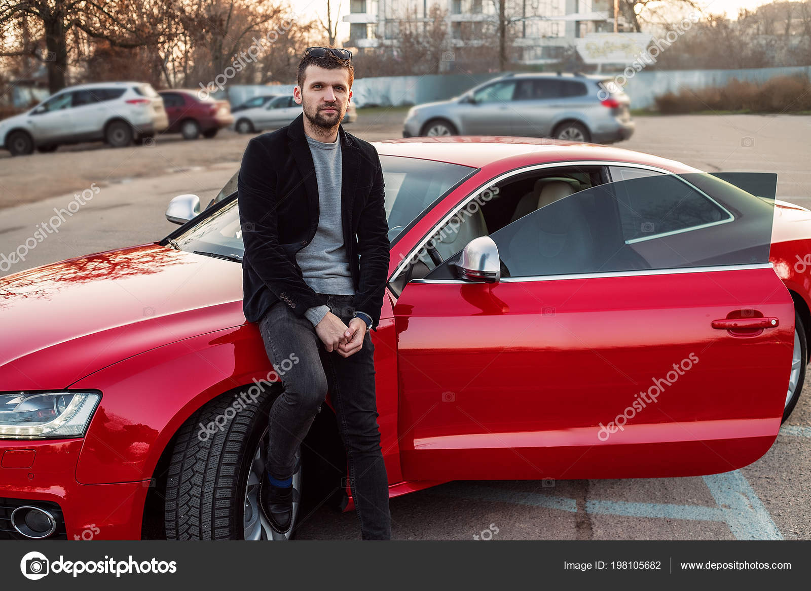 Attractive man posing in convertible car. Stock Photo | Adobe Stock