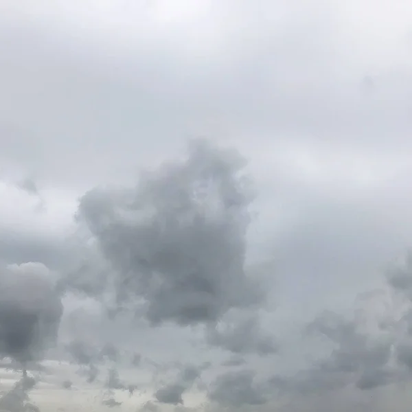 Monochrome grey cloudy sky background