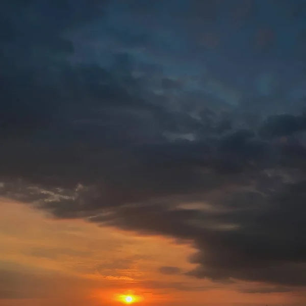 Colourful background of dramatic sky at dusk