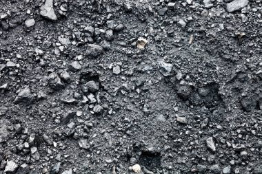 Kara kömür arka planı. Küçük parçacıklar ve toz