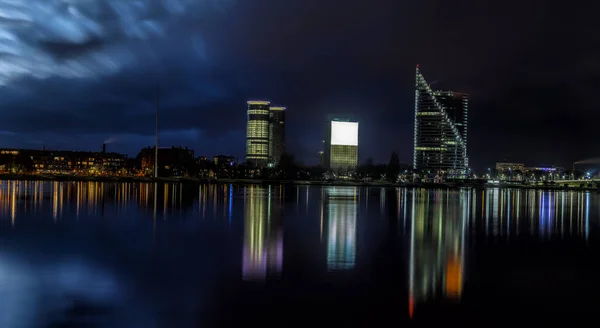 Riga Skyline Some Skyscrapers Night Shot Scenic Water Reflections Daugava — Stock Photo, Image