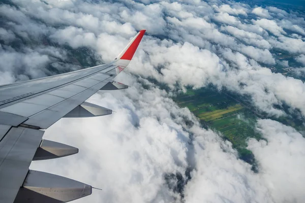 Avião Nas Nuvens Imagem De Stock