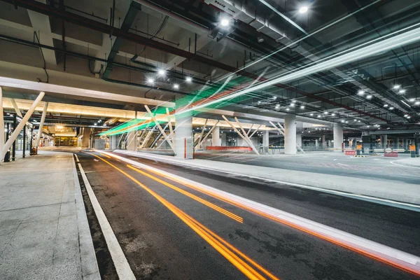 Bus light trail in parking — Stock Photo, Image