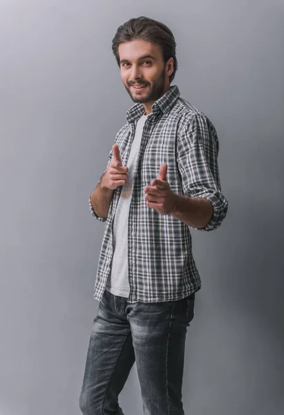Handsome Bearded Man Casual Clothes Pointing Looking Camera Smiling Gray — Stock Photo, Image