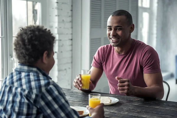 Afro American Father Son Casual Clothes Eating Wooden Table Together — Stock Photo, Image