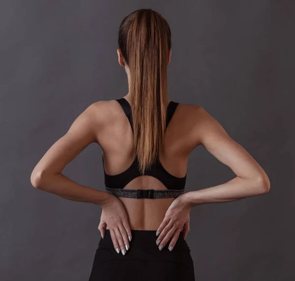 Vista Trasera Hermosa Chica Ropa Deportiva Sobre Fondo Gris — Foto de Stock