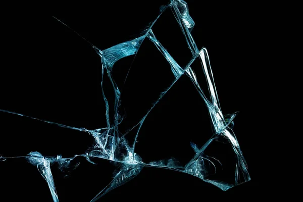 孤立したイメージ抽象化の形で亀裂の黒い背景に壊れたミラーガラス — ストック写真