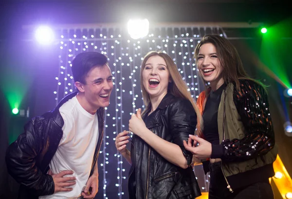 Youth at the party, a group of young people at a disco