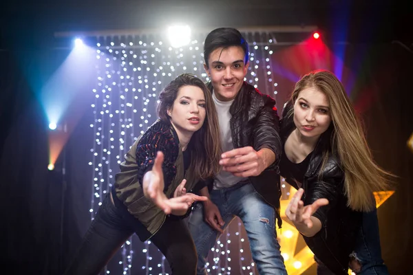 Youth at the party, a group of young people at a disco