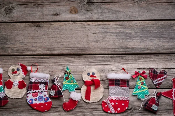 Christmas background on the fear of wooden boards, handmade toys