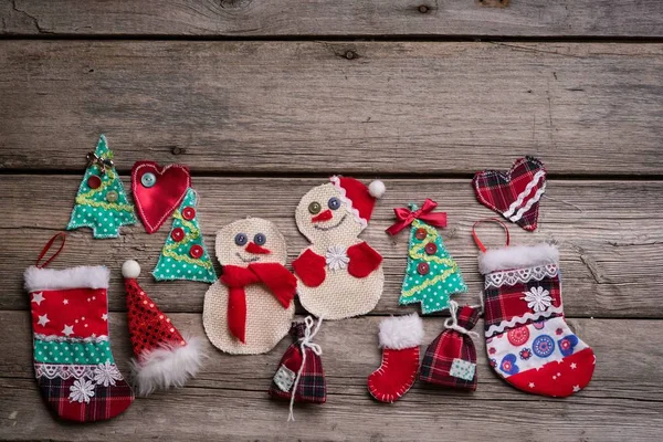 Christmas background on the fear of wooden boards, handmade toys