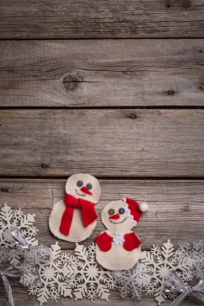 Christmas background on the fear of wooden boards, handmade toys