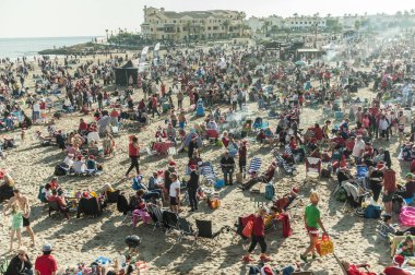 12/25/2018. Photo of big crowd of people at la zenia public beach in torrevieja on christmas day. Spain clipart