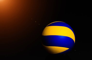 siyah arka plan üzerine voleybol topu.