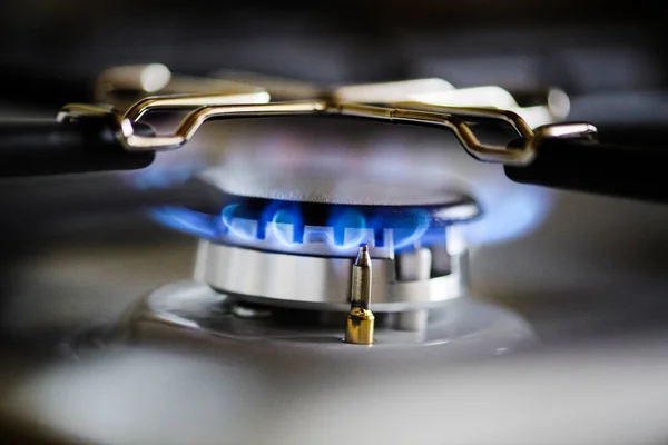 Natural gas burning on kitchen gas stove — Stock Photo, Image