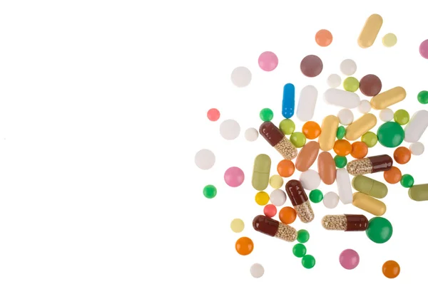 Surtido de píldoras, tabletas y cápsulas de medicamentos farmacéuticos. — Foto de Stock