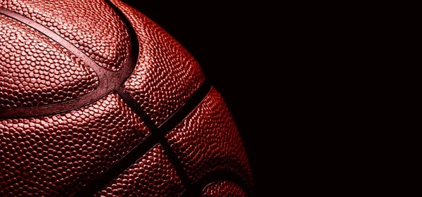 Pelota de baloncesto sobre fondo negro. — Foto de Stock