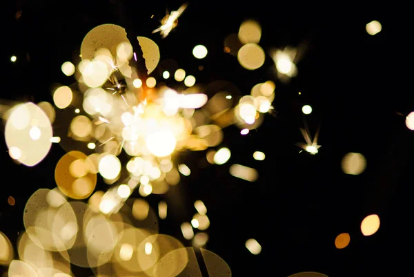 Glowing Sparks in the dark Royalty Free Stock Photos