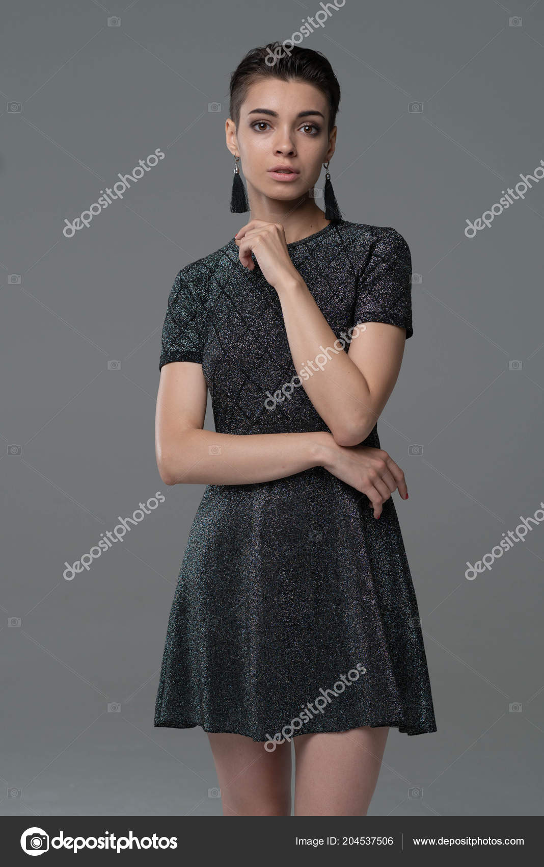 https://st4.depositphotos.com/10086424/20453/i/1600/depositphotos_204537506-stock-photo-young-beautiful-girl-posing-studio.jpg