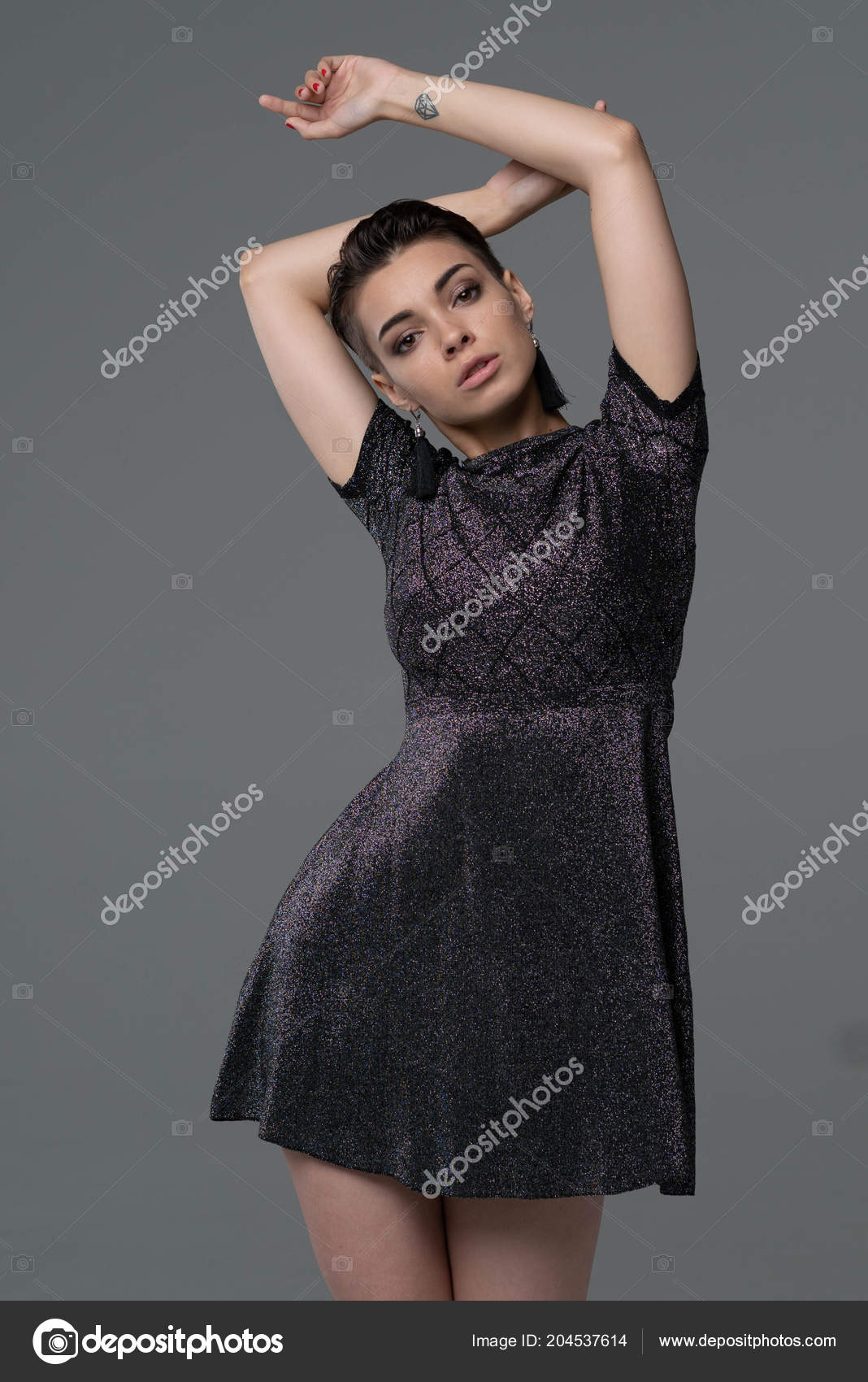 https://st4.depositphotos.com/10086424/20453/i/1600/depositphotos_204537614-stock-photo-young-beautiful-girl-posing-studio.jpg