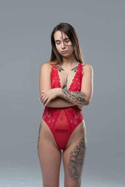 Young Beautiful Girl Posing Studio Standing Red Bodysuit — Stock Photo, Image