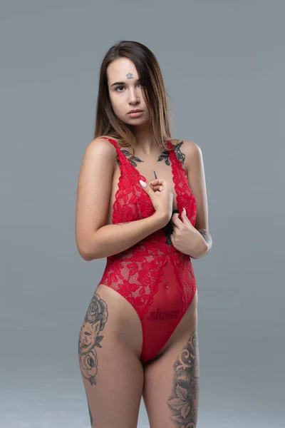 Young Beautiful Girl Tattoos Posing Studio Standing Red Lingerie — Stock Photo, Image
