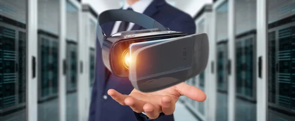 Businessman on blurred background using virtual reality glasses technology 3D rendering