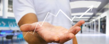 İşadamı üzerinde çizilmiş ok kadar holding arka plan bulanık