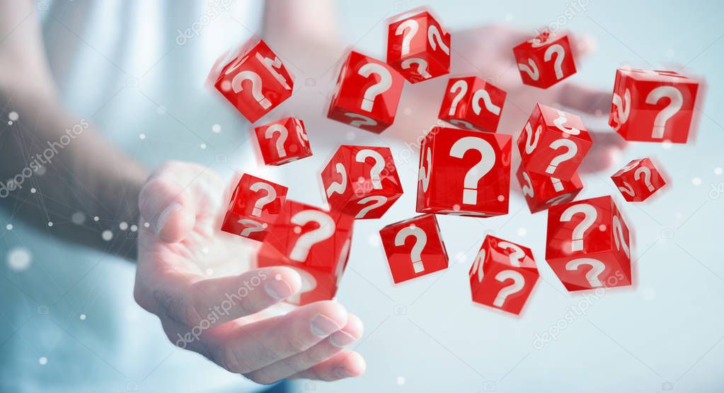 Businessman on blurred background using cubes with 3D rendering question marks