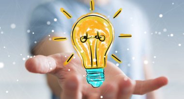 İşadamı üzerinde tutarak ve bir ampul kroki dokunmadan arka plan bulanık