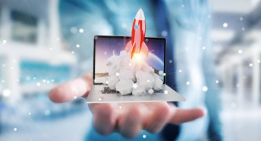 İşadamı üzerindeki bir laptop 3d render roket başlatılması ile arka plan bulanık