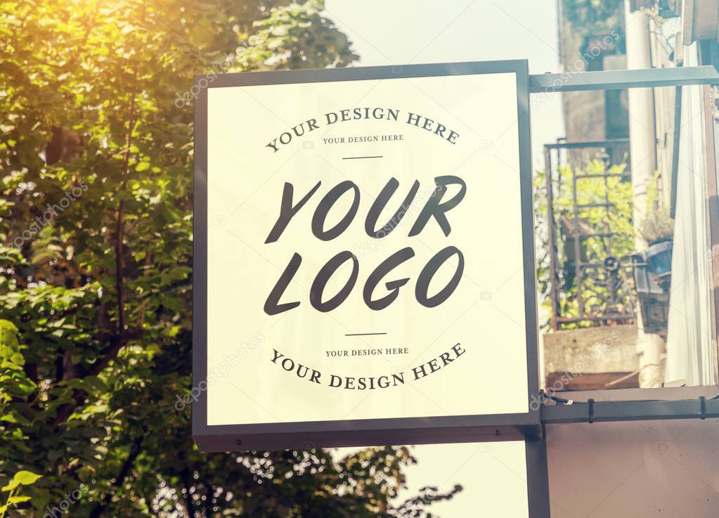 Store brand sign mockup in street
