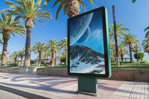 Outdoor billboard advertisement in seaside resort city with palms