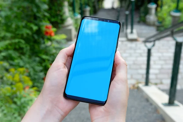 Woman Holding Modern Smartphone Green Park Summer Mockup — Stock Photo, Image