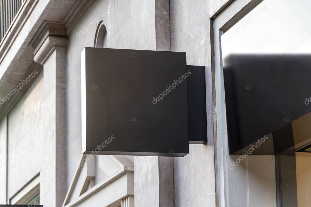 Store brand sign mockup in street on marble wall